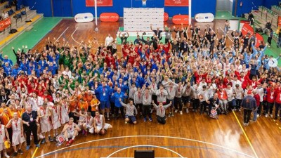 Large group photo on the basketball court