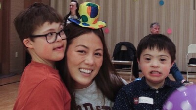 Mrs America 2022 Emma Broyles with two young athletes. 