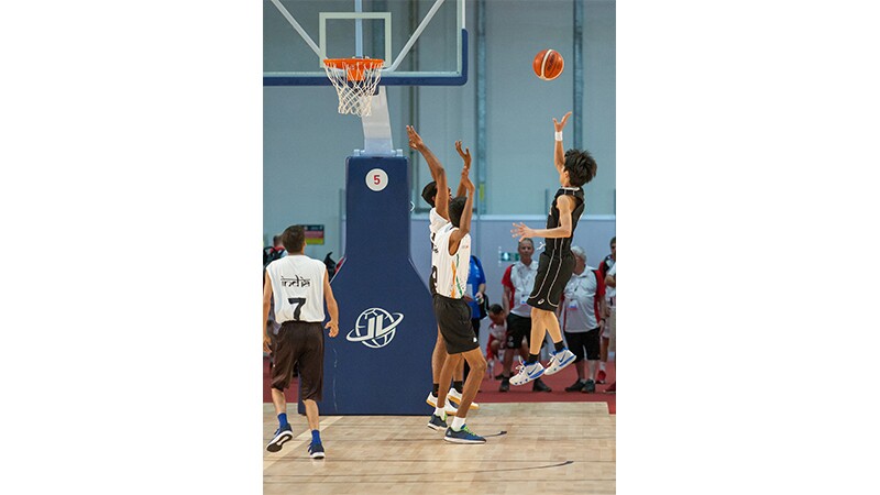 World Games Abu Dhabi 2019: athletes playing basketball. 