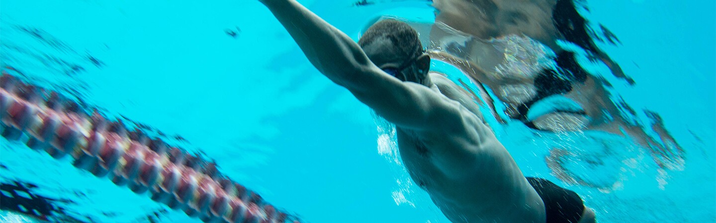 Athlete swimming under water. 