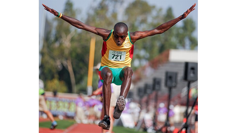 A male athlete at Special Olympics World Summer Games Los Angeles 2015 performing the long jump. 