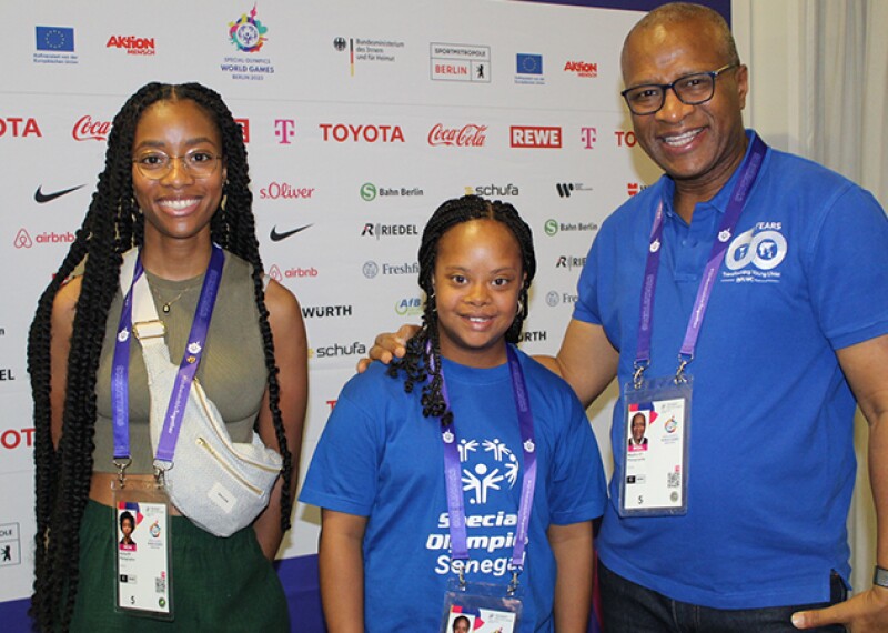 Khadija Sy, center, with members of her Unified media team: her sister, Aïcha, and her father, Makha.