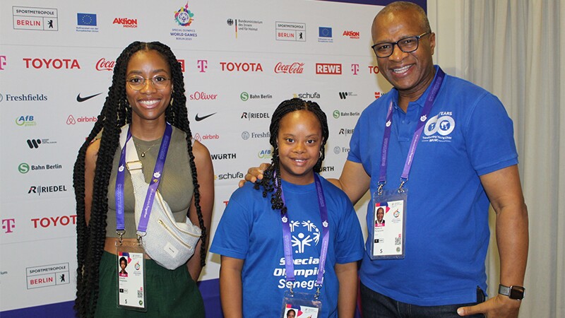 Khadija Sy, center, with members of her Unified media team: her sister, Aïcha, and her father, Makha.