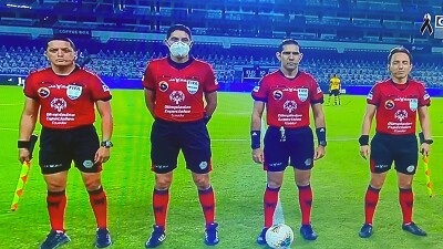 Referee team from Ecuador National Soccer Championships wearing Special Olympics Ecuador-branded uniforms.