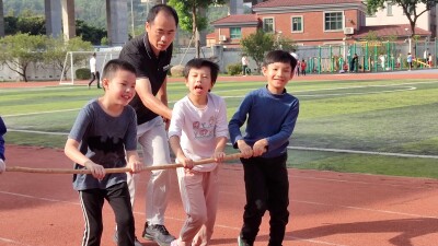 A group of athletes exercising with their coach