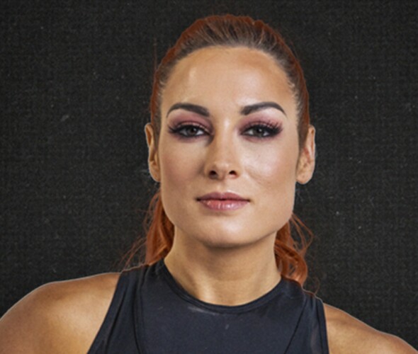 Becky Lynch in a black work out tank top. 