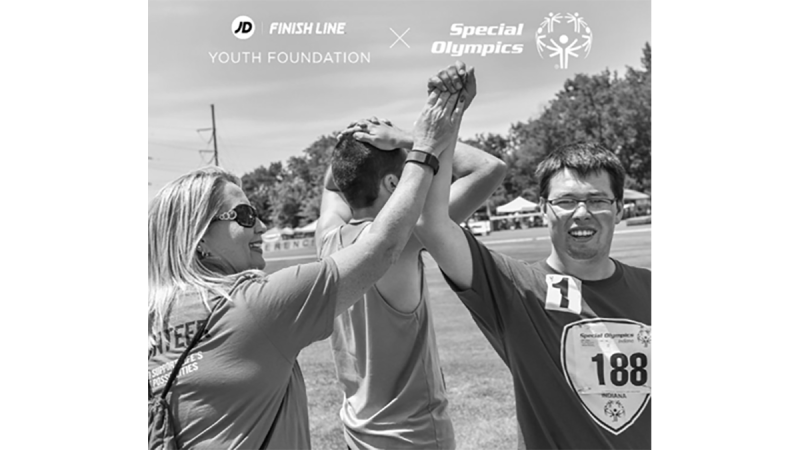 Two people high-fiving. 