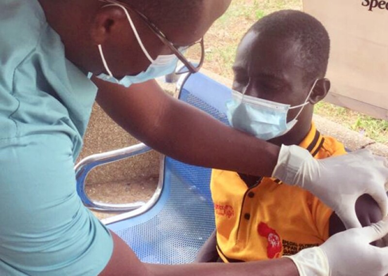 Special Olympics Ghana athlete receives COVID-19 vaccine at our vaccination clinic.