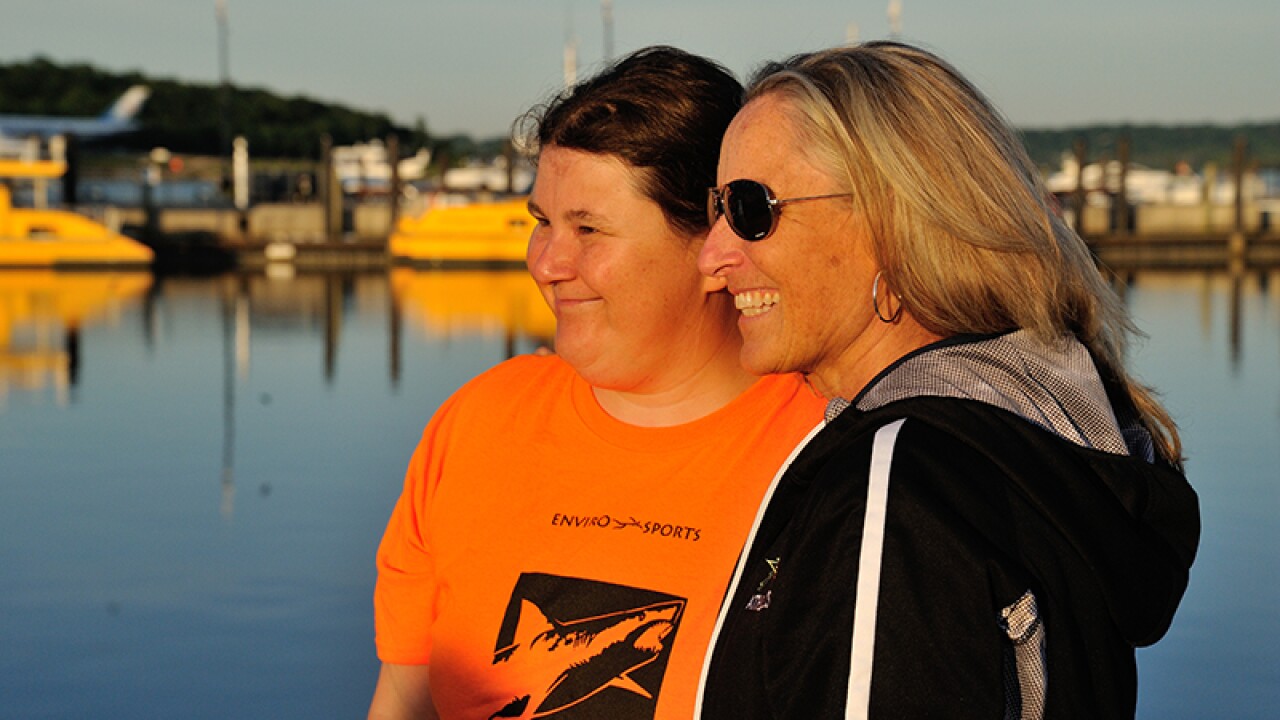 Two women looking off into the sunset