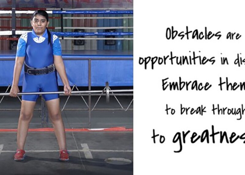 Young woman deadlifting. Text reads: Obstacles are opportunities in disguise. Embrace them to break through to greatness. 