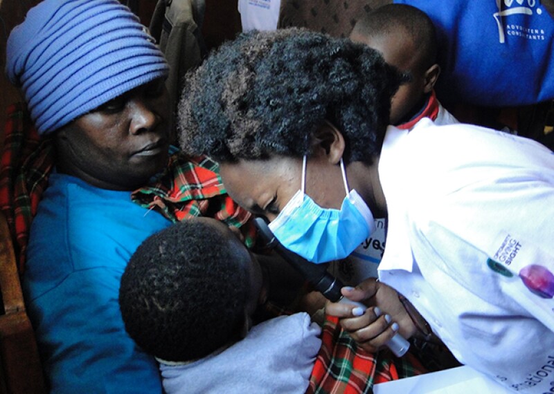 An athlete receiving an eye exam. 