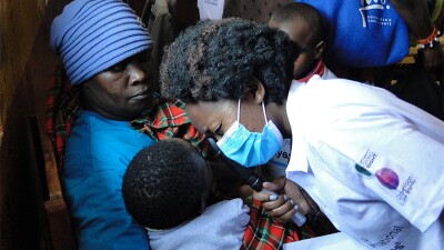 An athlete receiving an eye exam. 