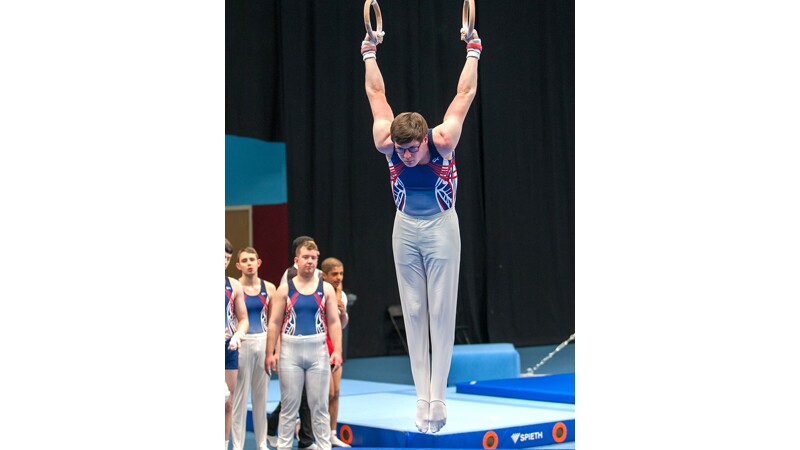 World Games Abu Dhabi 2019: male athletes on the matts during a gymnastics event. 