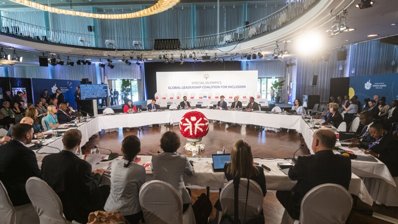 People sitting at a Roundtable during the announcement of the Special Olympics Global Leadership Coalition for Inclusion