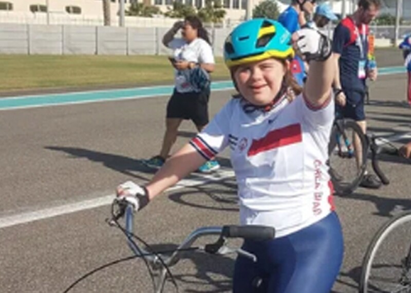 Young woman on her bike. 