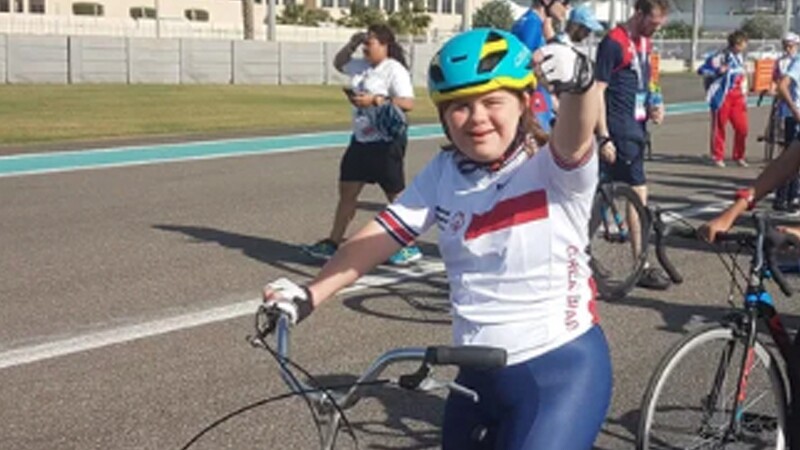 Young woman on her bike. 