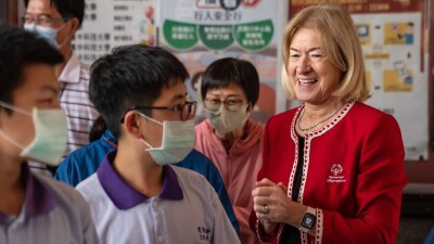 Mary Davis visiting with students. 