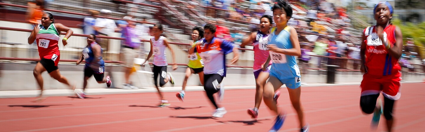 Athletes running on a track