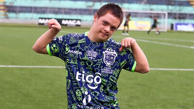 Special Olympics El Salvador athlete wears the limited-edition soccer shirt designed by Special Olympics athletes.