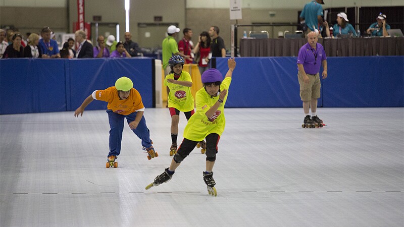 Three roller skaters racing at Special Olympics World Summer Games Los Angeles 2015