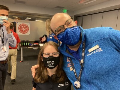 Two Special Olympics athletes pose for a picture. 