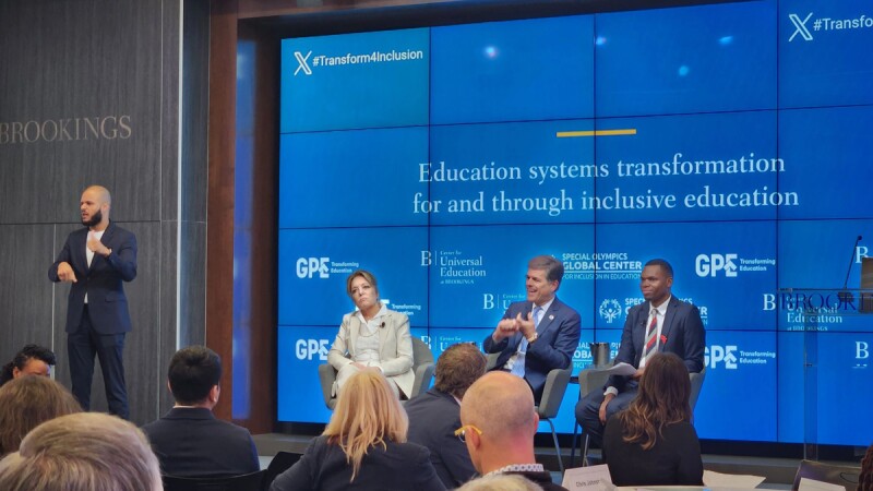 Photo shows Nyasha Derera, Yasmine Sherif, and Dr. Tim Shriver, engaged in a discussion on transforming education systems to be fully inclusive of learners with disabilities. 