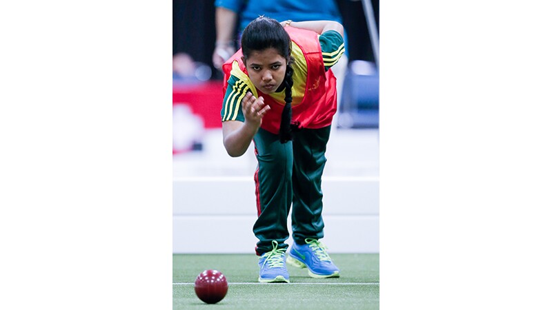 A young woman playing bocce at Special Olympics World Summer Games Los Angeles 2015