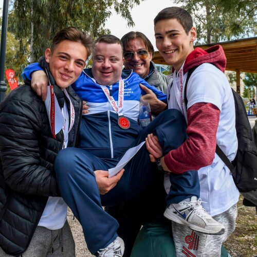 A group of students smile for a photo