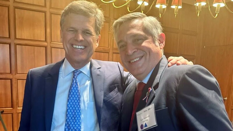 Photo shows Hon. Luis Fernando Ramirez, The Minister of Education and Sciences in Paraguay, and Dr. Tim Shriver engaged in a discussion on inclusive education prior to the Symposium organized by Special Olympics, Brookings, and Global Partnership for Education. The image captures their collaboration and dialogue on advancing inclusive education initiatives.