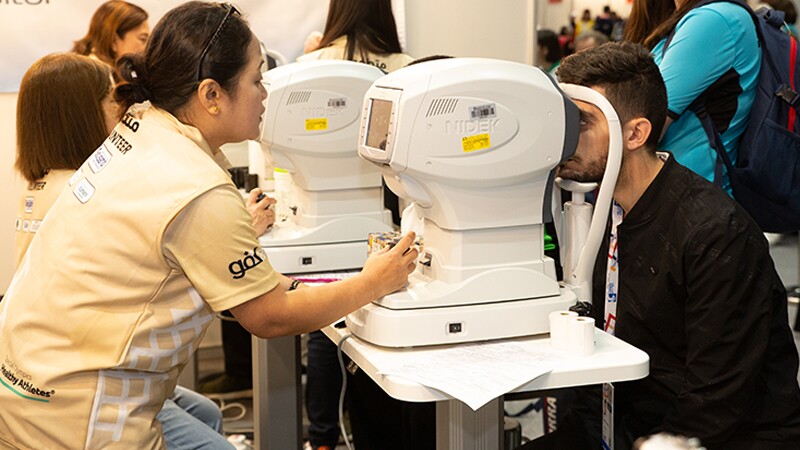 World Games Abu Dhabi 2019: athlete receiving an optical exam at a Healthy Athletes Opening Eyes event. 