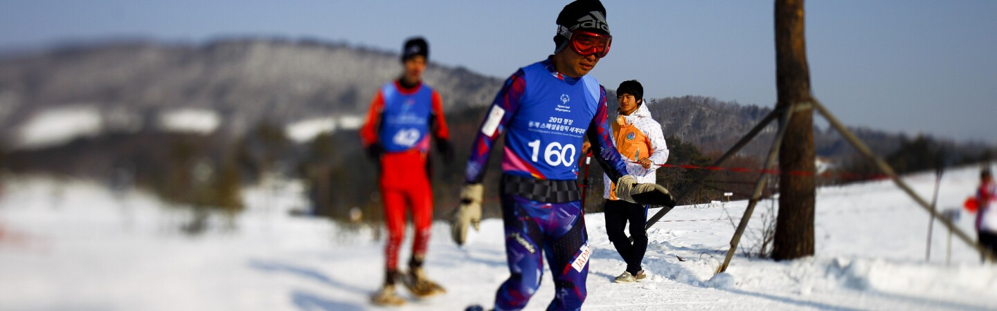 Snowshoe athletes on the snow racing. 