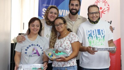 Members of the Youth Leaders Council, including Omnia (top left) and Sherif (far right), pose together after an activity.