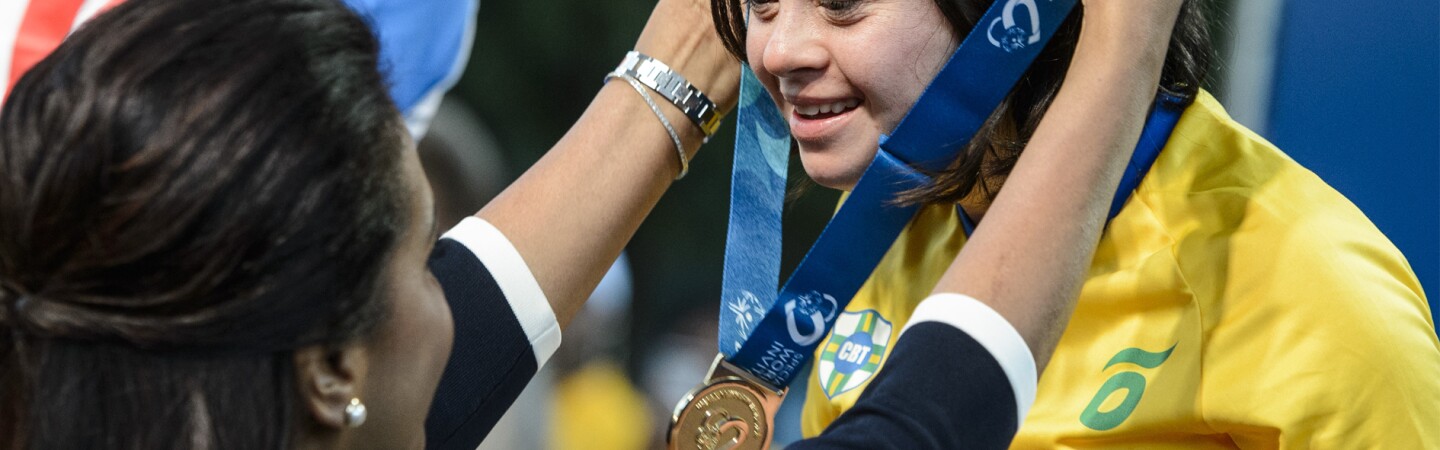 Athlete being presented a medal